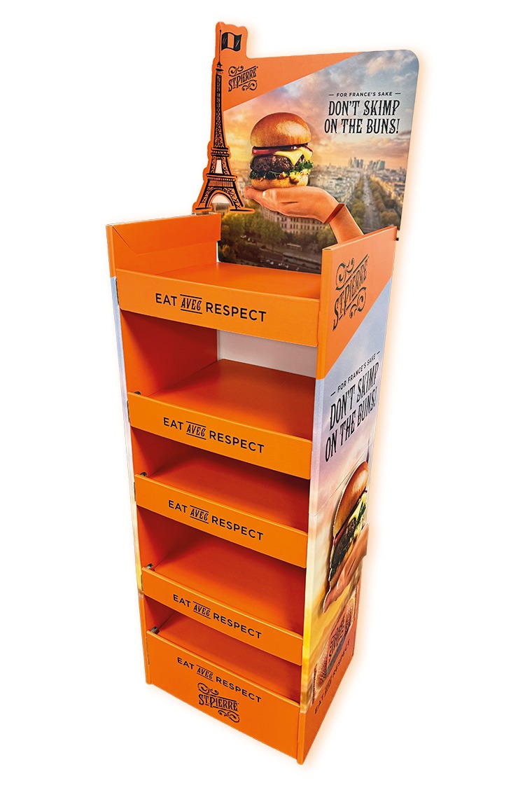 A FSDU created for the bakery section to display St Pierre products. The displays feature orange as the primnary colour with cut-outs of a hand and the Eiffel Tower around the header